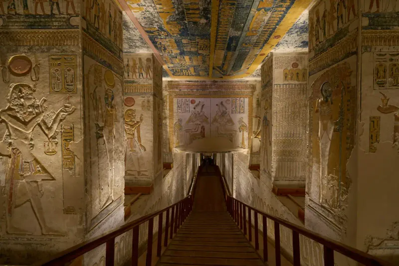 Painted walls inside an Egyptian tomb in Luxor. Photograph, not a reconstruction.